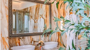 A bathroom with two sinks, a large mirror, and a decorative ceiling. - Kasbah La Moun The Art of Hospitality (Marrakech)