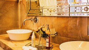 A bathroom with two sinks, a mirror, and a towel rack. - Kasbah La Moun The Art of Hospitality (Marrakech)