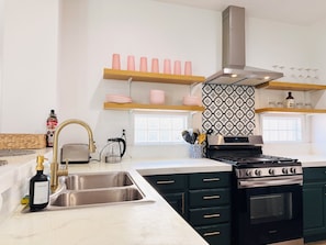 Fridge, microwave, oven, stovetop - Modern Coachella Villa with Pool Spa and Game Room (Coachella)