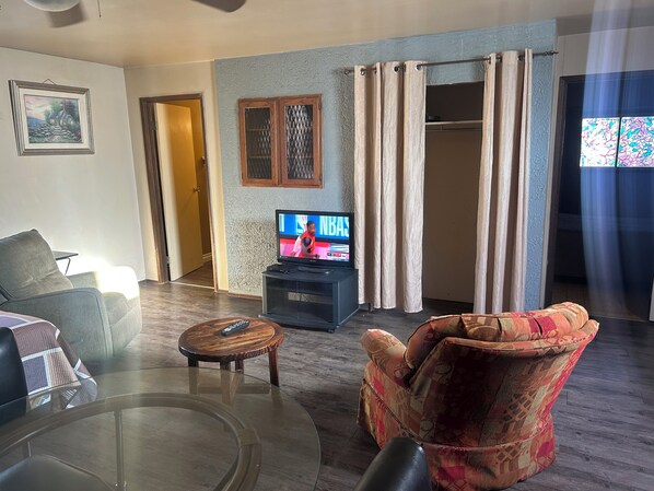 Cabane Confort, vue jardin | Coin séjour