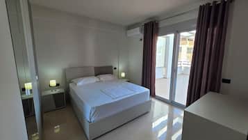 Family Apartment, Partial Sea View | Iron/ironing board, WiFi (free)