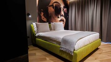 Superior Apartment, 1 Bedroom, Balcony, City View | Desk, laptop workspace, blackout drapes, iron/ironing board