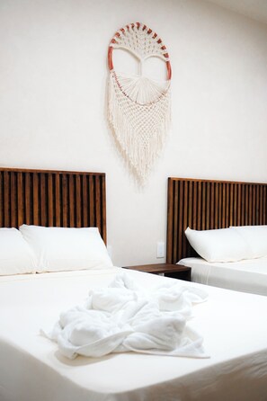 Quadruple Room | Hypo-allergenic bedding, free WiFi, bed sheets