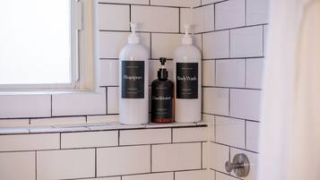 Hair dryer, towels, soap, shampoo