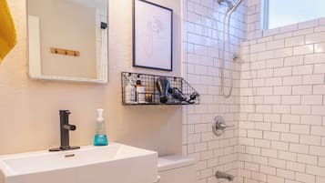 Hair dryer, towels, soap, shampoo