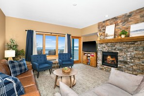 TV, fireplace, books