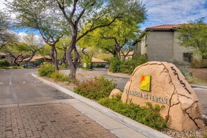 A residential area with a large rock sign reading "VERANDA AT VENTANA". - 2-BD 2-BA condo in the fantastic Catalina Foothills, 2 pools & fitness Ctr gated (Tucson)