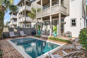 A residential building with a swimming pool, outdoor seating, and a covered patio area. - Private Pool, Walk 2 Rosemary & Beach, Sleeps 10 (Inlet Beach)