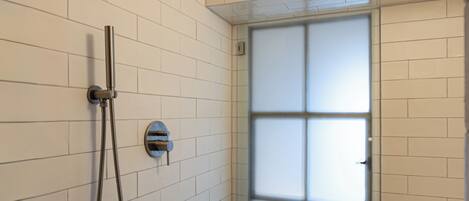 Shower, hair dryer, towels, soap