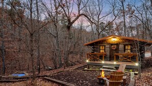A rustic cabin with a deck, fire pit, and outdoor seating. - Boulder Hot Tub Buffalo River Fairy Tale  Cottage (Jasper)