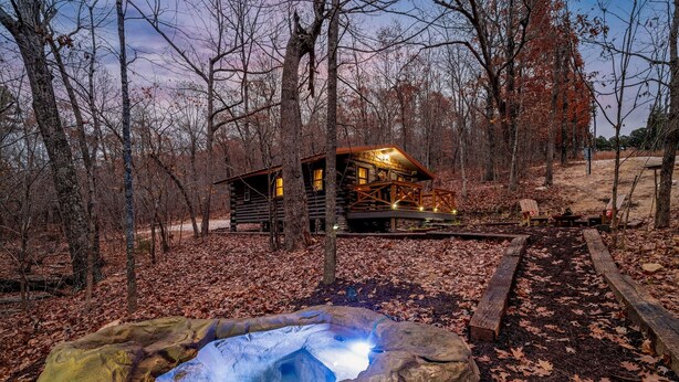 A rustic cabin with a hot tub in a forested area. - Boulder Hot Tub Buffalo River Fairy Tale  Cottage (Jasper)