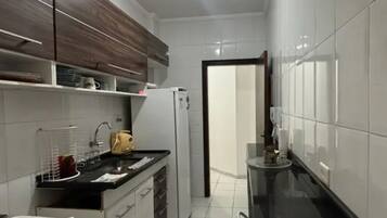 Fridge, microwave, stovetop, cookware/dishes/utensils