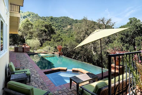 Outdoor pool, a heated pool. Luxury Silicon Valley Work and Wellness Oasis