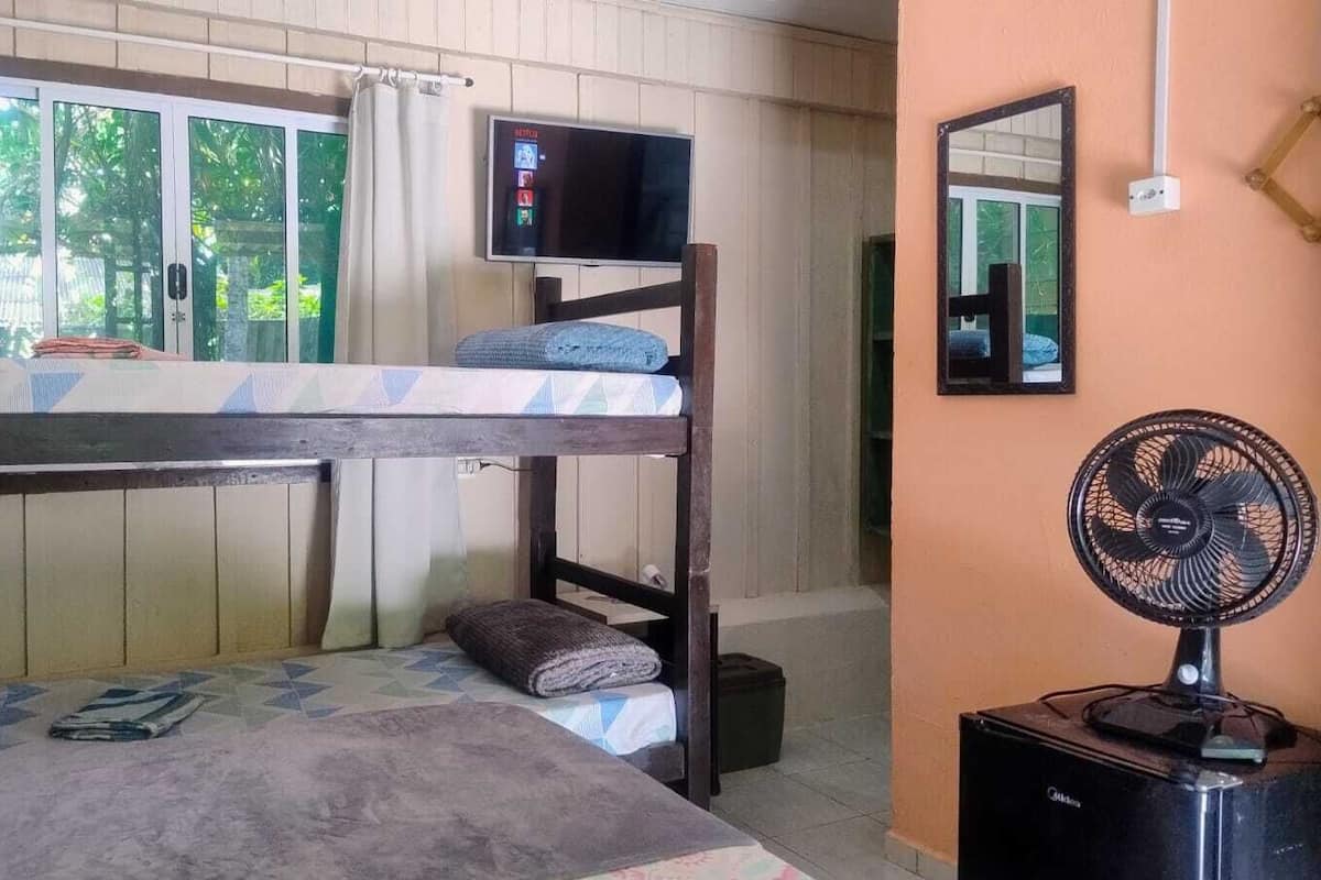 Classic Quadruple Room, Multiple Beds, Private Bathroom, Beachside | Laptop workspace, free WiFi, bed sheets