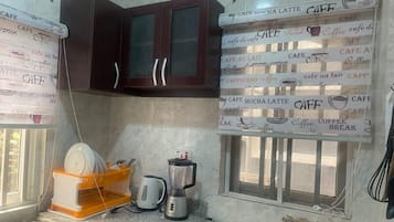Luxury Apartment, 1 Bedroom | Private kitchen | Full-sized fridge, oven, stovetop, cookware/dishes/utensils