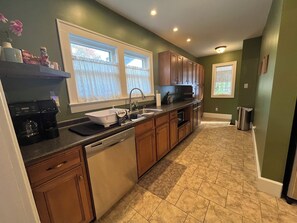 Microwave, oven, stovetop, dishwasher - You'll love your stay at the Bohemian Bungalow centrally located in Terre Haute! (Terre Haute)