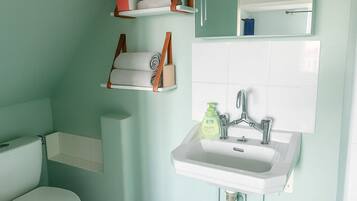 Hair dryer, towels, soap, toilet paper