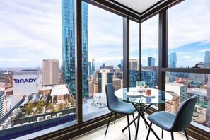 Dining - LV42 High-rise condo CBD panoramic city view (Melbourne)