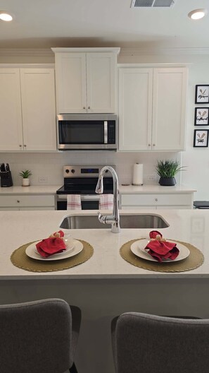Microwave, oven, stovetop, dishwasher - New Townhome Haven  Near Hospital Shops & Atlanta (Marietta)
