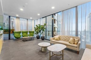 Living area - Luxe 2BR Retreat POOL, GYM & PARKING South Yarra (South Yarra)