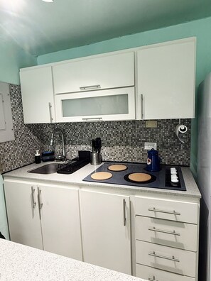 Private kitchen - Borinqueen Bliss  1-bedroom apartment  with pool in vibrant Condado (Condado)
