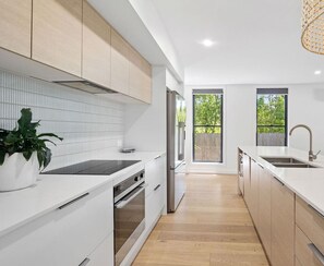 Fridge, microwave, oven, stovetop - Stylish Sun Soaked Duplex Walk to Beach (Narrawallee)