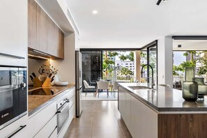 Fridge, microwave, oven, stovetop - Avalon Resort Deluxe 3 Bedroom Apartment (Sunshine Coast)