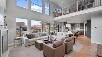 Smart TV, fireplace, books, offices