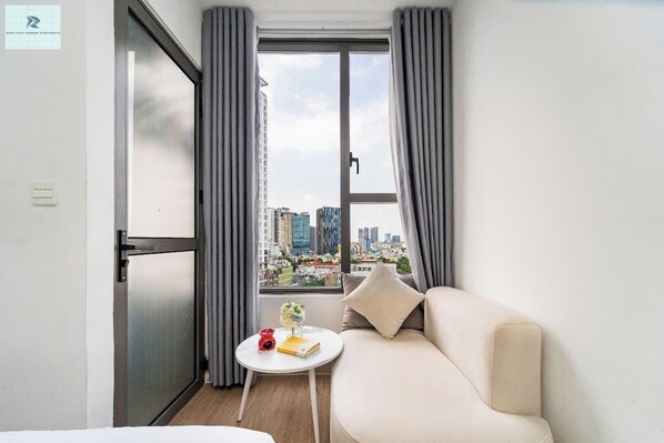 Classic Room, 1 King Bed, Non Smoking, City View | Desk, blackout drapes, iron/ironing board, free WiFi - River Gate Premier Apartments (Thanh Pho Ho Chi Minh)