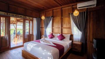 Superior villa, balkon, uitzicht op tuin | Een strijkplank/strijkijzer, gratis wifi, beddengoed