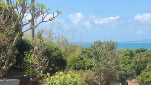 A covered outdoor area with a view of the sea and mountains. - Archer View - 72 Archer Steet, Emu Park (Emu Park)