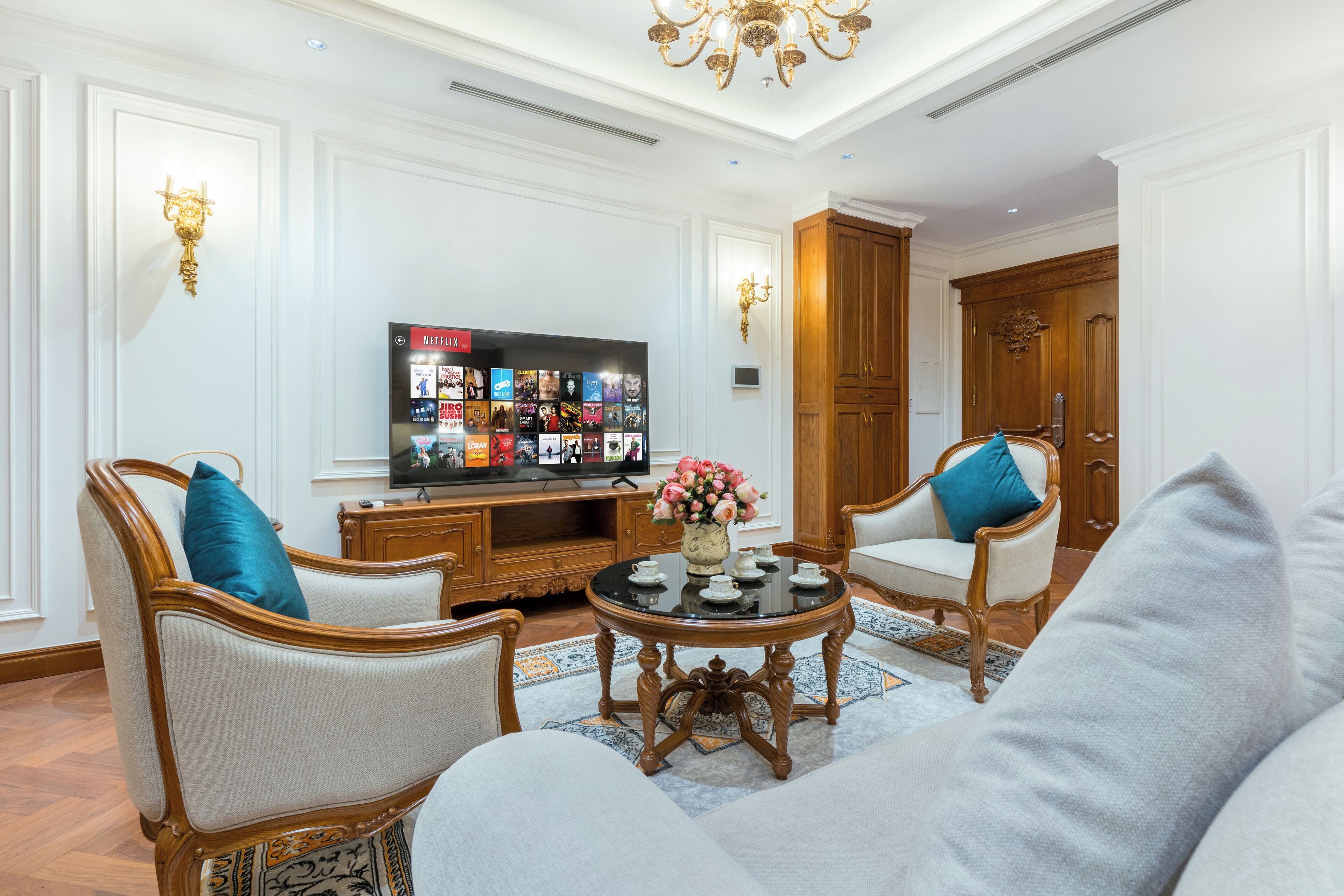 Family Suite, City View | Living area | 60-inch TV with cable channels