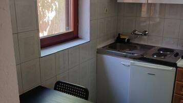 Apartment (One Bedroom Apartment with Terrace an) | Private kitchen | Fridge