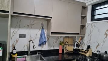 Microwave, stovetop, coffee/tea maker, electric kettle