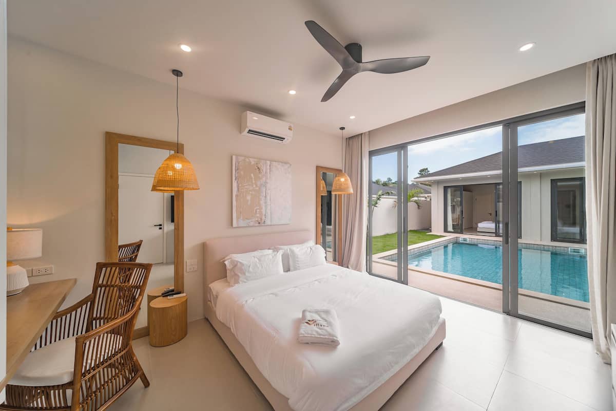 Desk, laptop workspace, blackout drapes, soundproofing