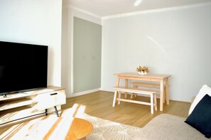 TV - Coastal Minimalist Retreat Steps from the Water (The Entrance)