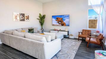 House (3 Bedrooms) | Living area | 43-inch flat-screen TV with cable channels, foosball, table tennis