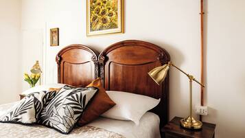 Premium bedding, down comforters, pillowtop beds, free minibar