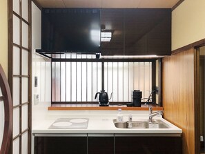 Fridge, microwave, stovetop, coffee/tea maker