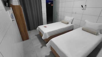 Habitación estándar con 2 camas individuales | Wifi gratis y ropa de cama