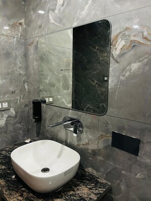 Shower, free toiletries, towels, soap