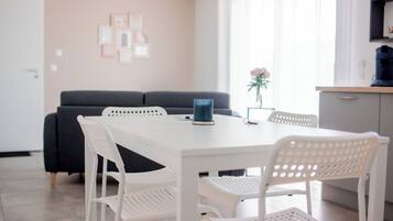 Comfort Apartment, 2 Bedrooms, Courtyard View | Living area | TV