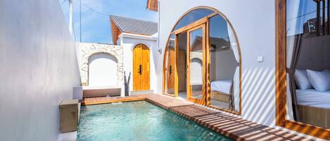 Villa | Living area | 32-inch Smart TV with digital channels