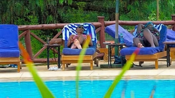 A poolside area with lounge chairs and a wooden deck. - The Great Rift Valley Lodge & Golf Resort (Kasarani)