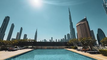 Outdoor pool, pool umbrellas, pool loungers