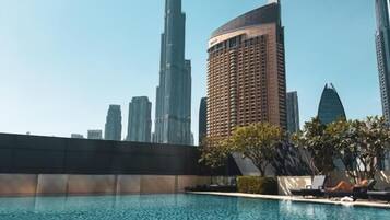 Outdoor pool, pool umbrellas, pool loungers