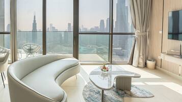 Signature Sky Residence - Panoromic (Burj/Fountain Views) | Living area | 60-inch Smart TV with digital channels, iPad, streaming services