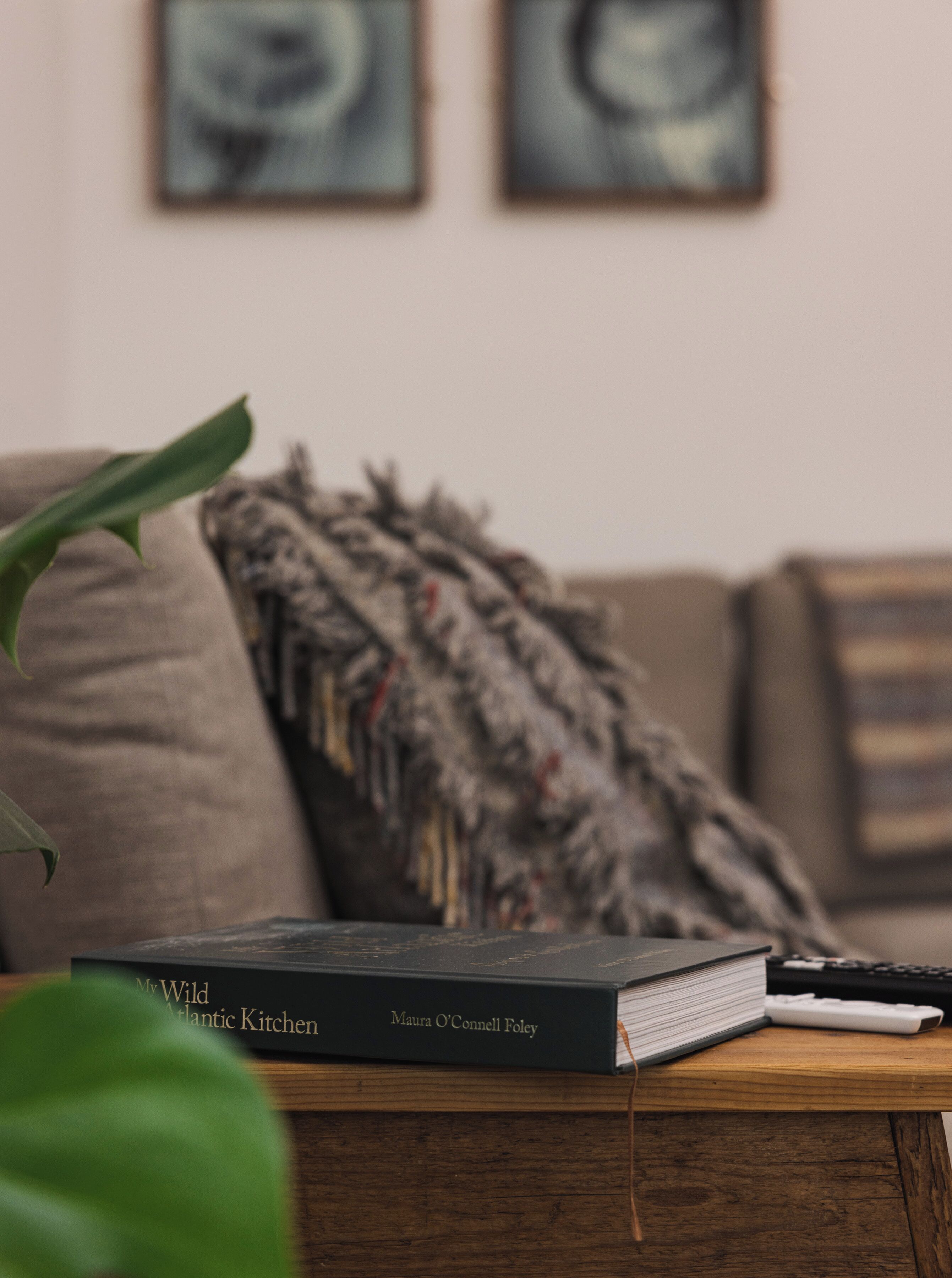 A book titled 'My Wild Atlantic Kitchen' by Maura O'Connell Foley on a wooden table.