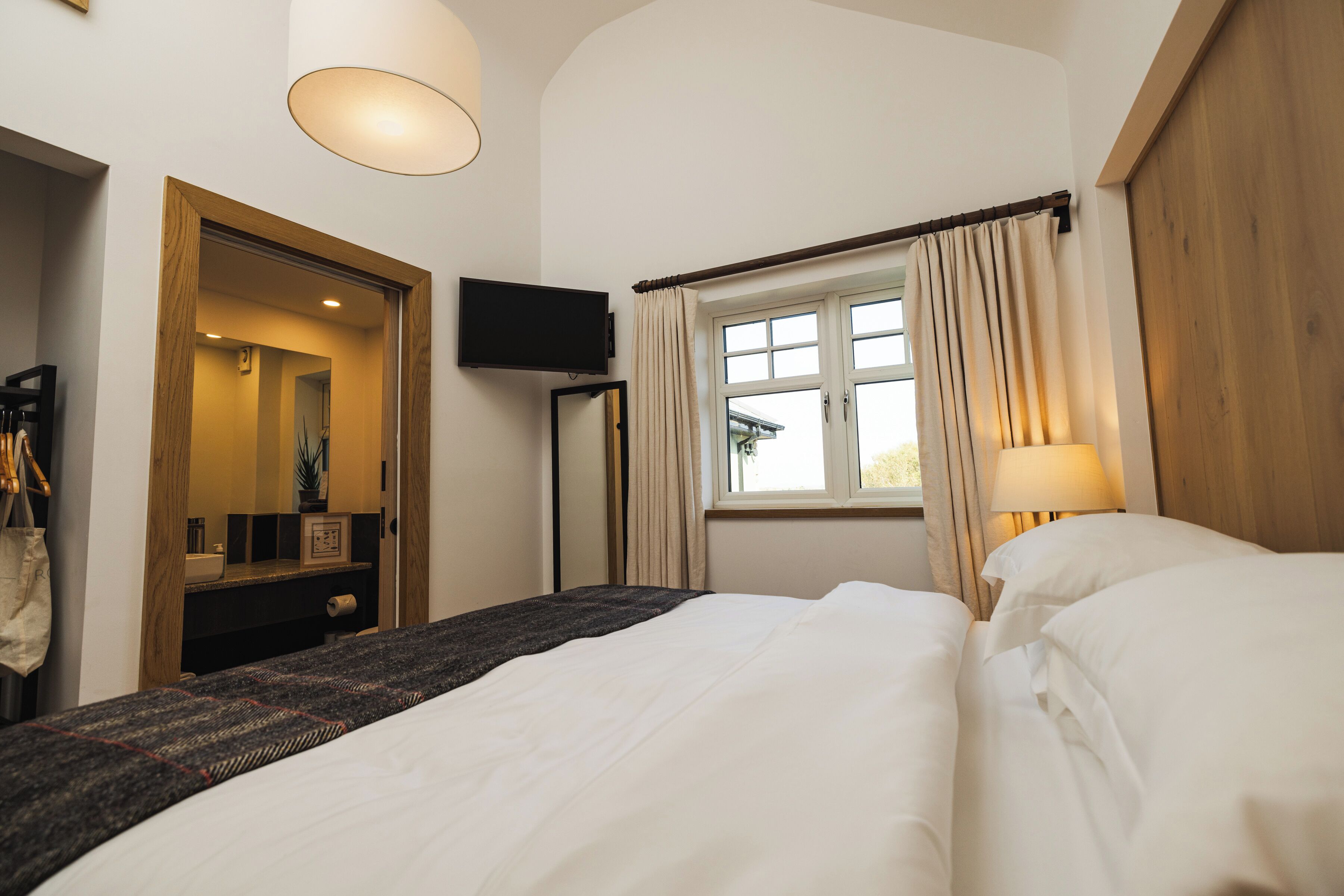 Premium bedding, down duvets, individually decorated