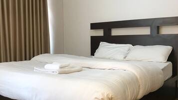 2 slaapkamers, een strijkplank/strijkijzer, internet, beddengoed